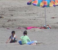 Kids playing near the Santa Cruz Beach Boardwalk.  Click for IncrediZoom Movie.