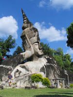 Massive reclining Buddha at Xieng Khuan