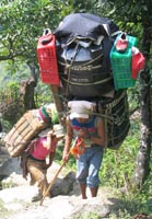Porters carry unwieldy loads